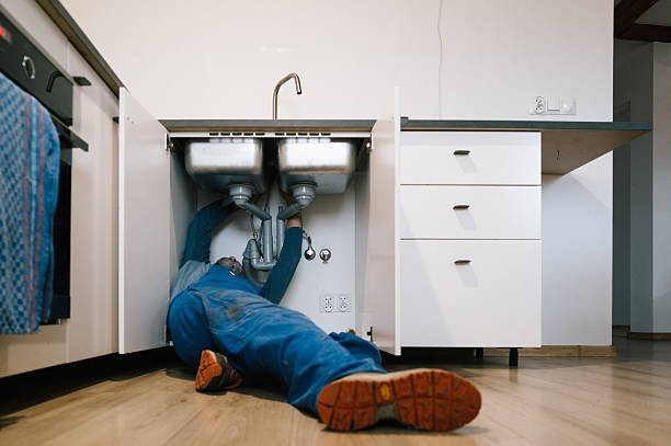Professional Emergency Plumber technician working in Storrs Mansfield, CT